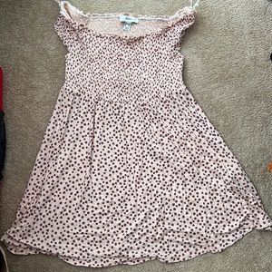 A cute summer dress with smocked neckline. It is from forever 21 +